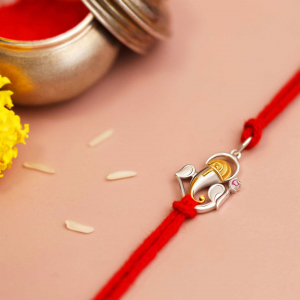 Ganesha Ruby Silver Studded Rakhi