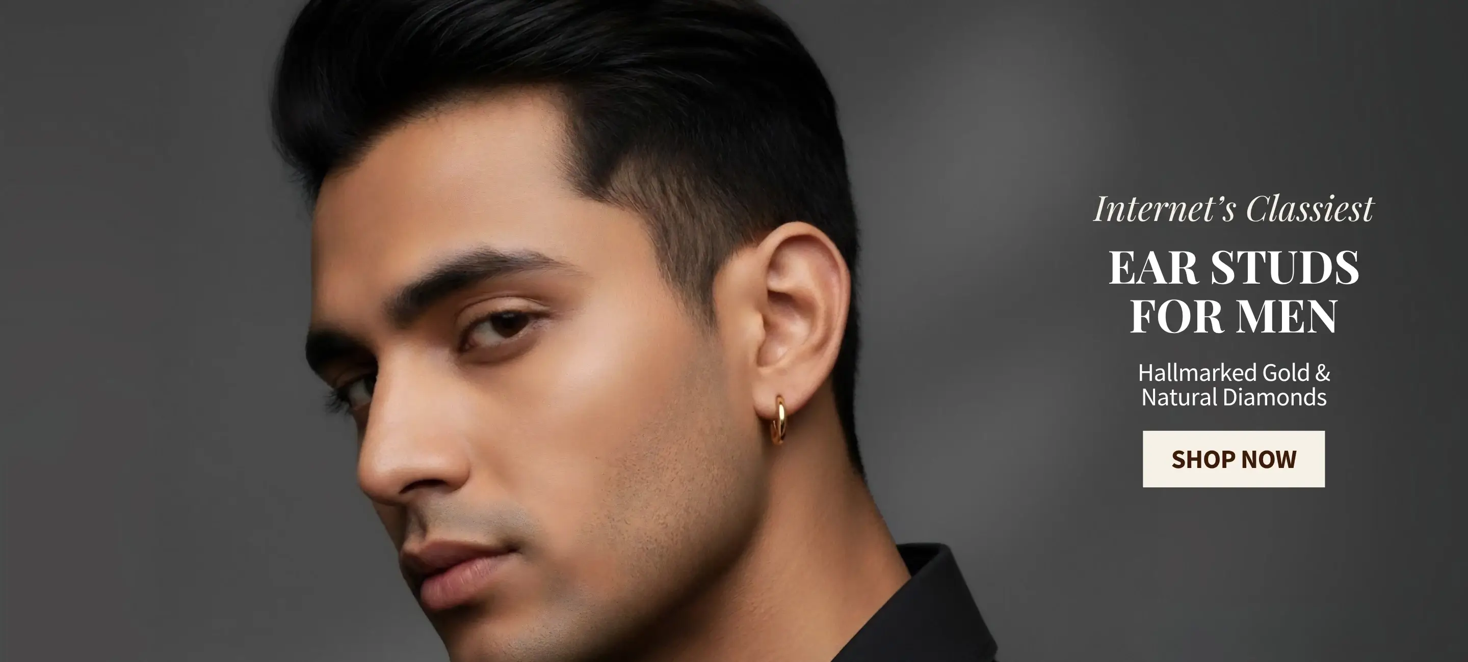 Man wearing gold ear stud